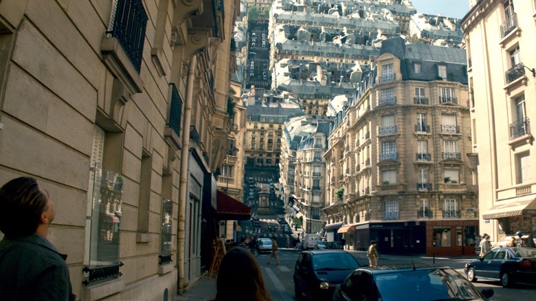 Dom Cobb and Ariadne looking a city folding over in 