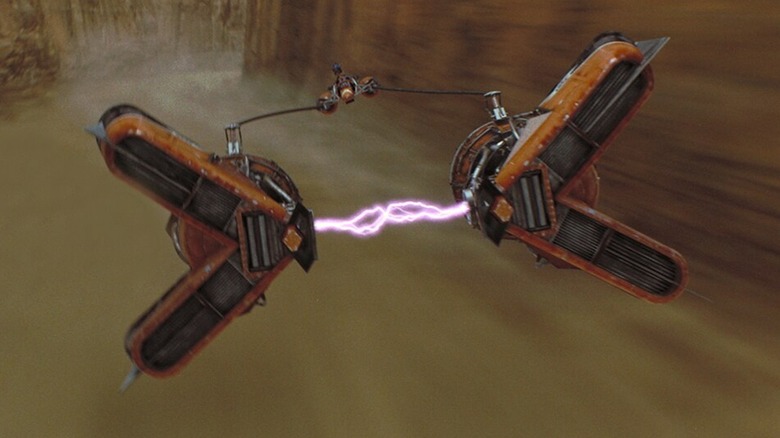 Sebulba in his podcacer racing in the canyon in Star Wars: The Phantom Menace