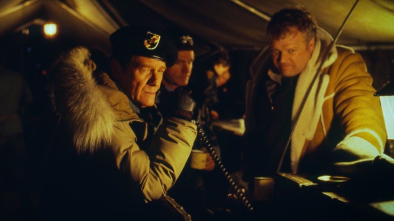 Trautman and Teasel communicate with Rambo in 