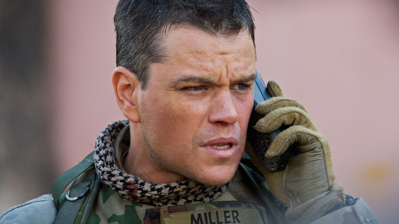 U.S. Army Officer Roy Miller talks on a mobile phone in 