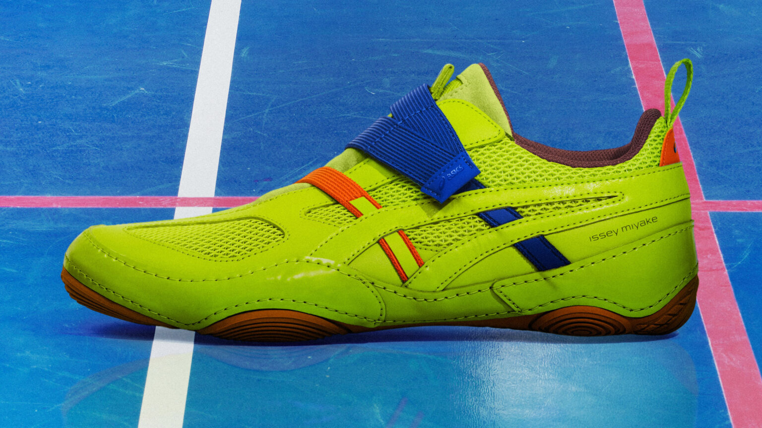 Issey Miyake designs “minimalist” Hyper Taping trainers for ASICS Bright green and blue trainer