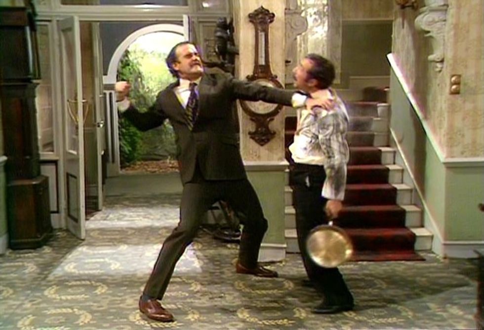 John Cleese as Basil Fawlty