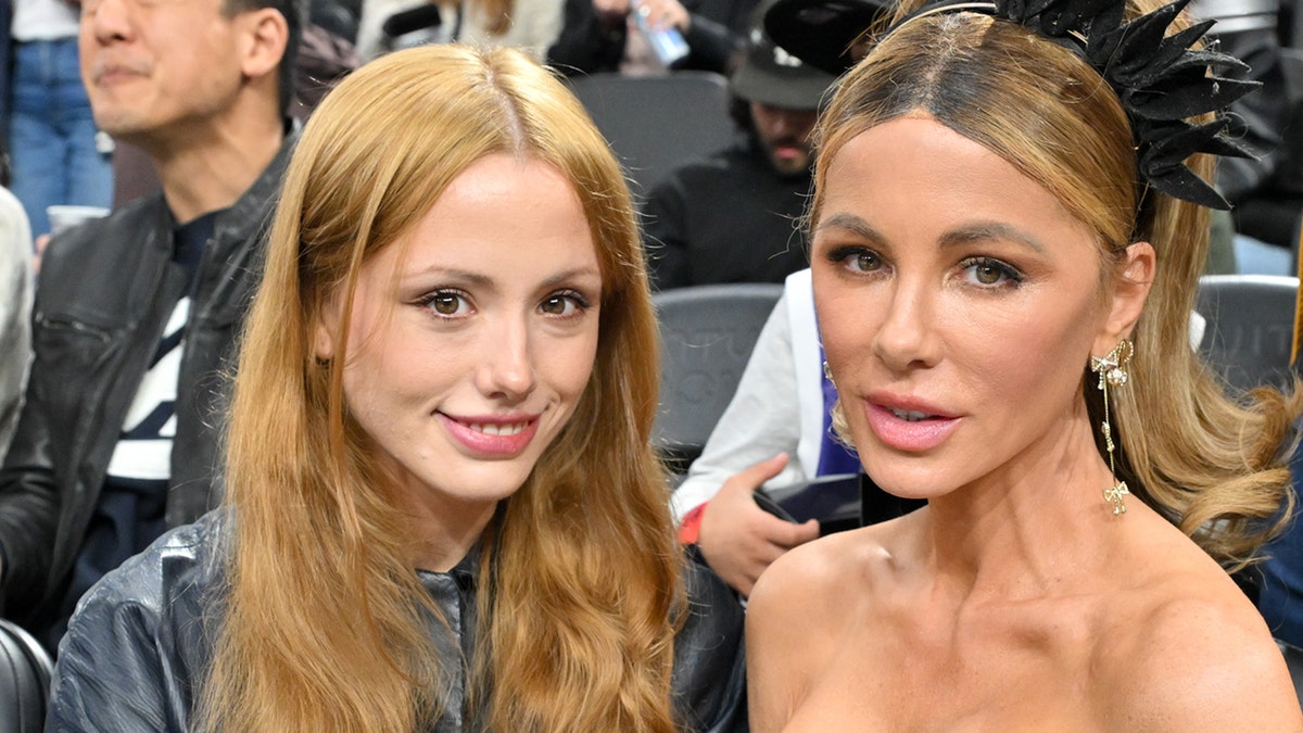 Kate Beckinsale and Lily Mo Sheen sit courtside while attending a Los Angeles Clippers vs. Los Angeles Lakers basketball game at Intuit Dome.
