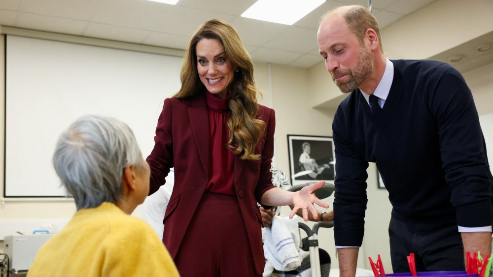 Kate Middleton wears a Roland Mouret maroon suit during a visit to Charing Cross Hospital on Jan. 8 in London.