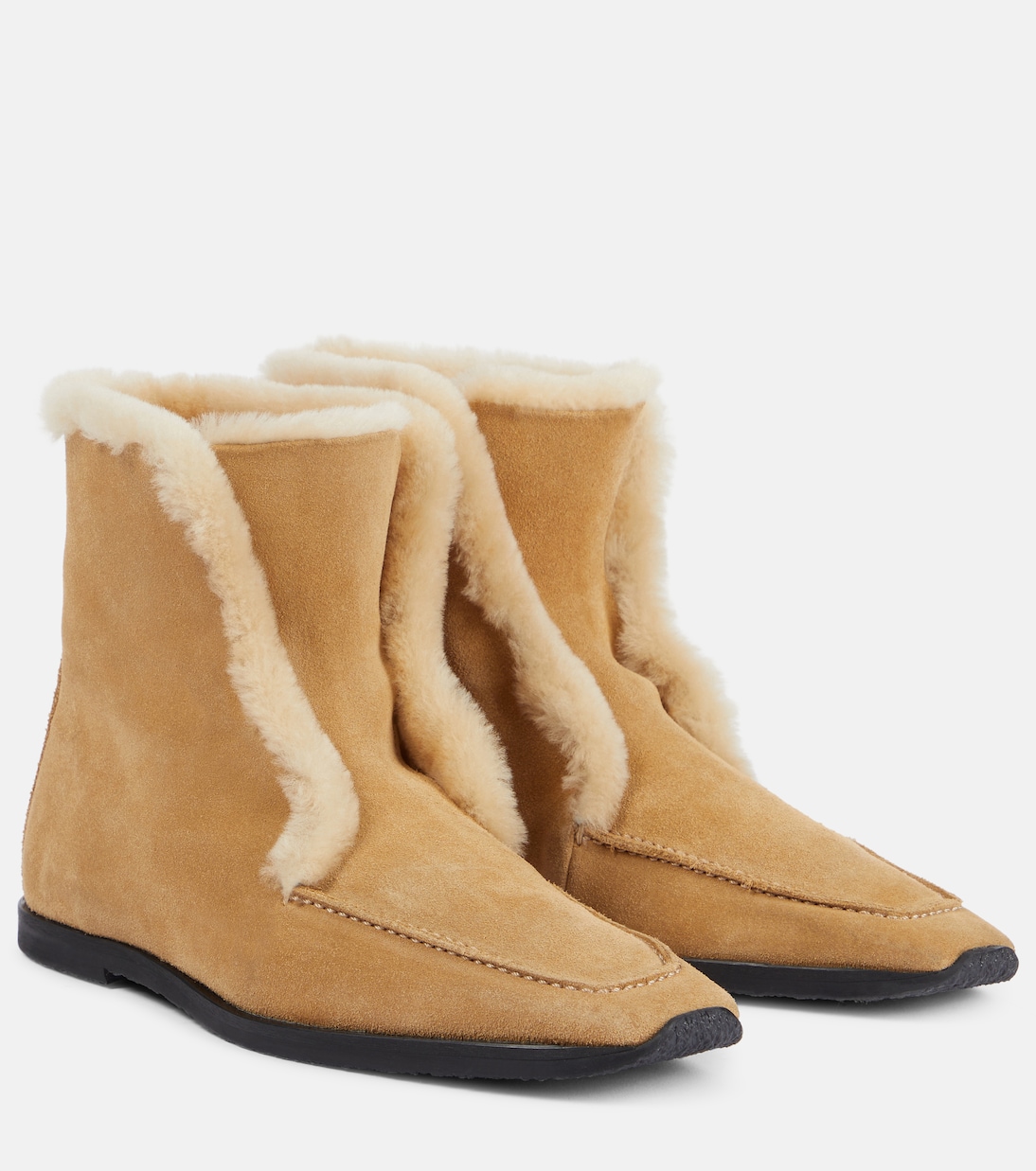 Shearling-Lined Suede Ankle Boots in Beige - Toteme