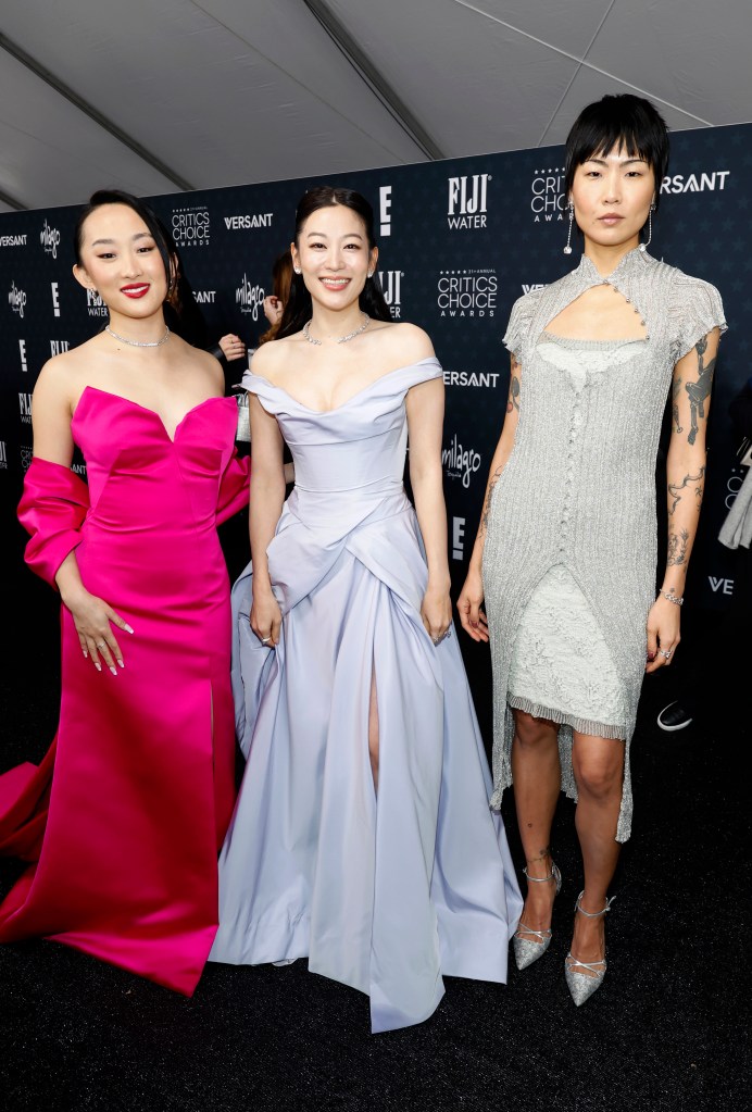 Ji-young Yoo, Arden Choe, and May Hong attend the 31st Annual Critics Choice Awards at Barker Hangar on January 04, 2026 in Santa Monica, California