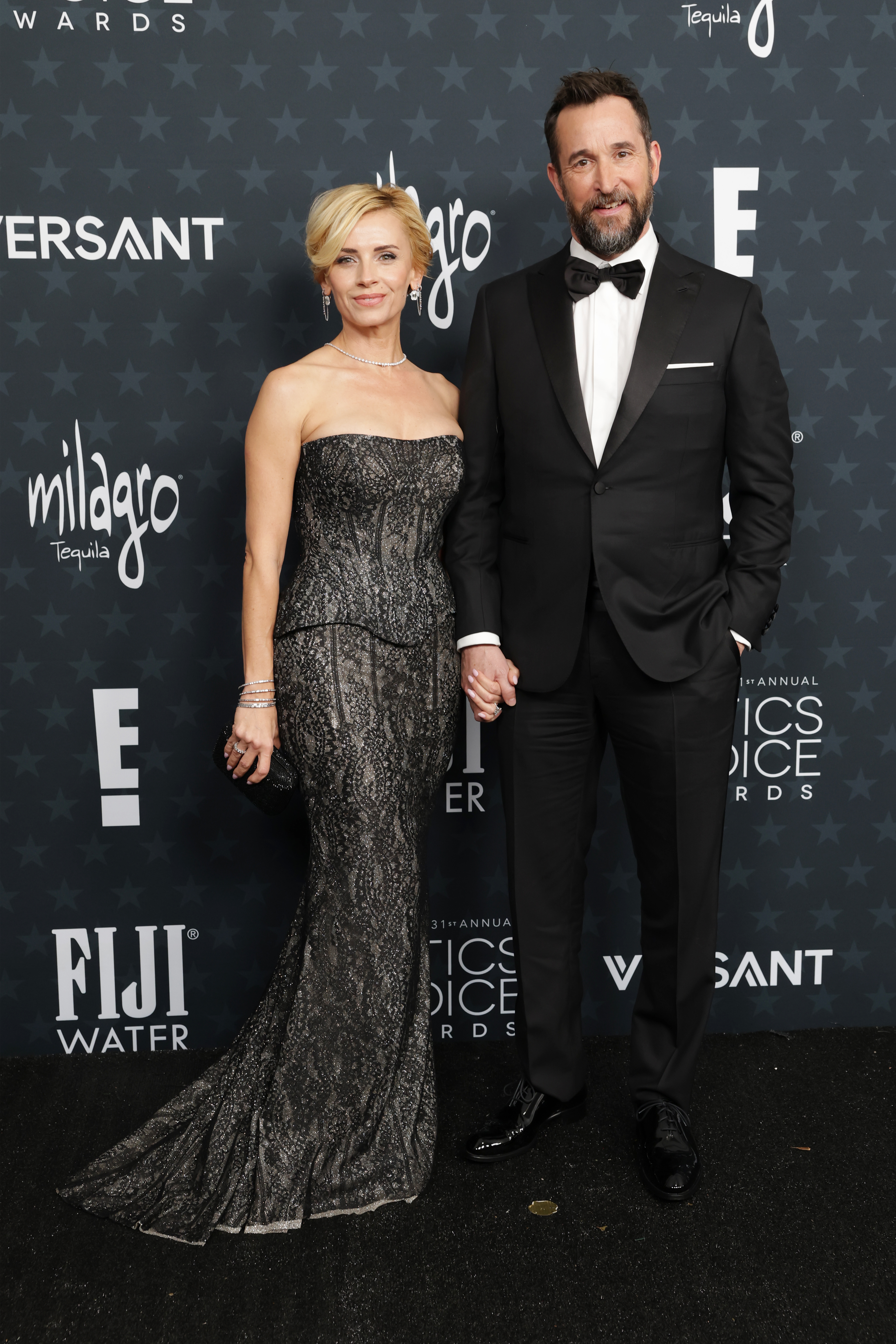 Sara Wells and Noah Wyle attend the 31st Annual Critics Choice Awards at Barker Hangar on January 04, 2026 in Santa Monica, California