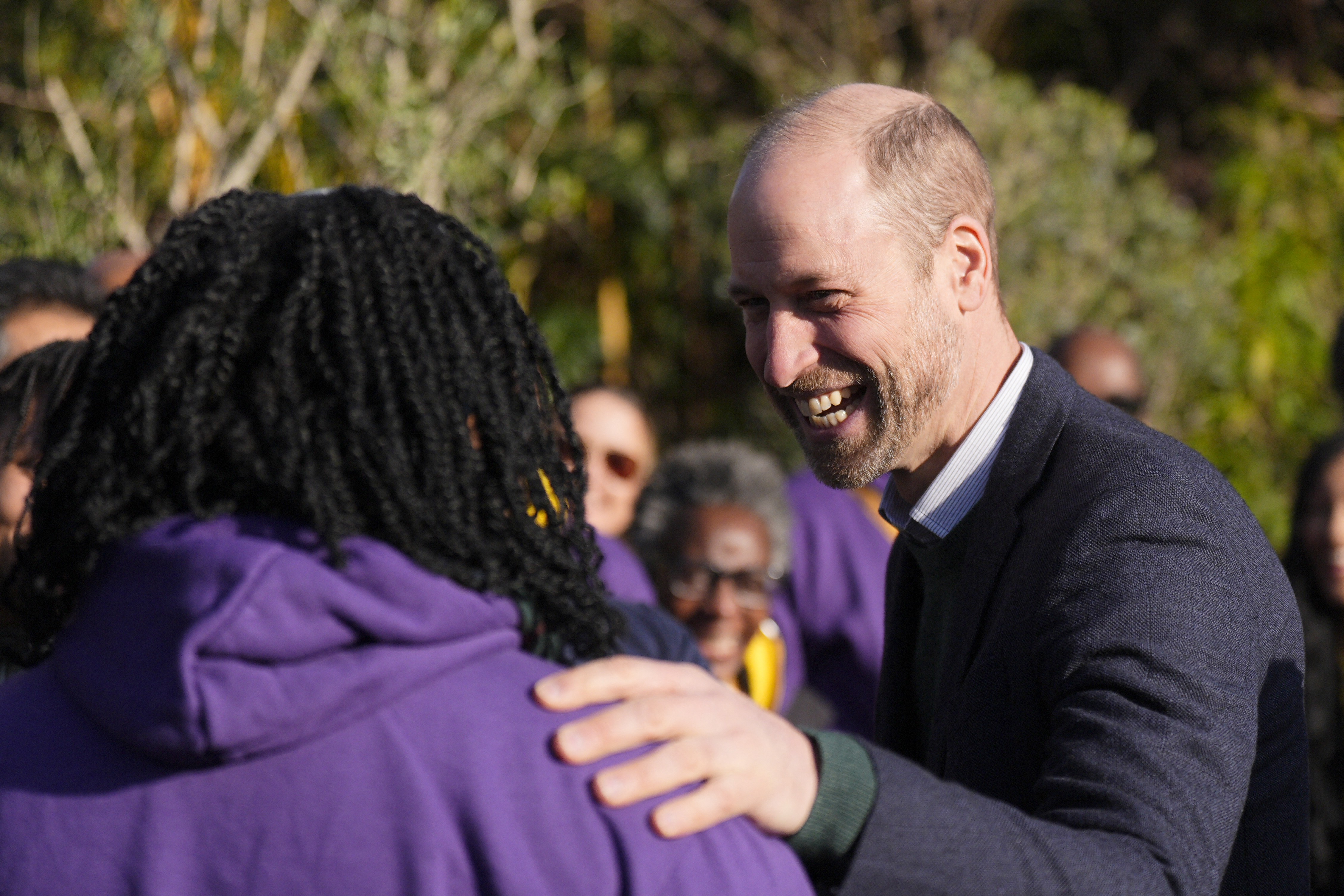 Britain's Prince William (R), Prince of Wales meets with staff during a visit to the BBC Children In Need's We Move FWD programme
