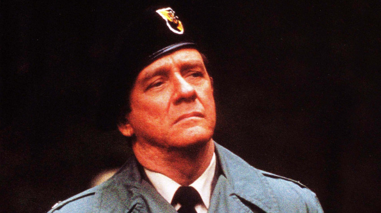 Colonel Trautman listening in 