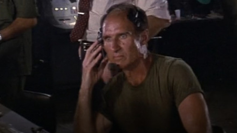 The radio operator listens in in 