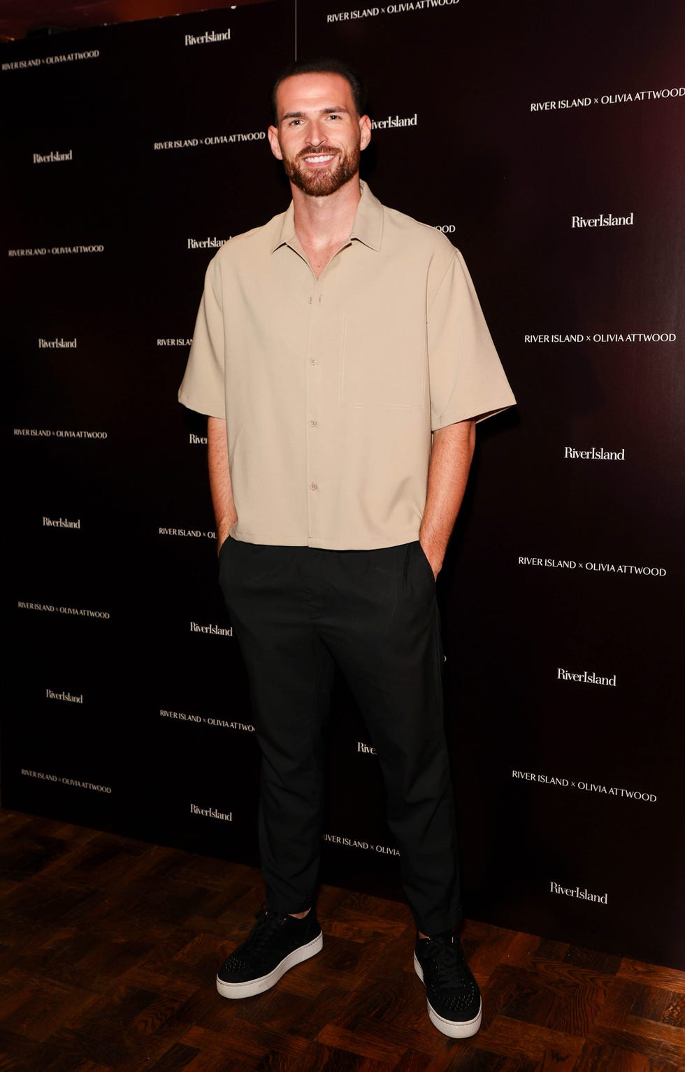 individual dressed in casual attire at a promotional event