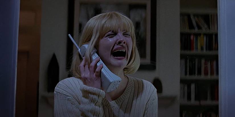 Casey (Drew Barrymore) is terrified while on the phone in the opening of Scream (1996).