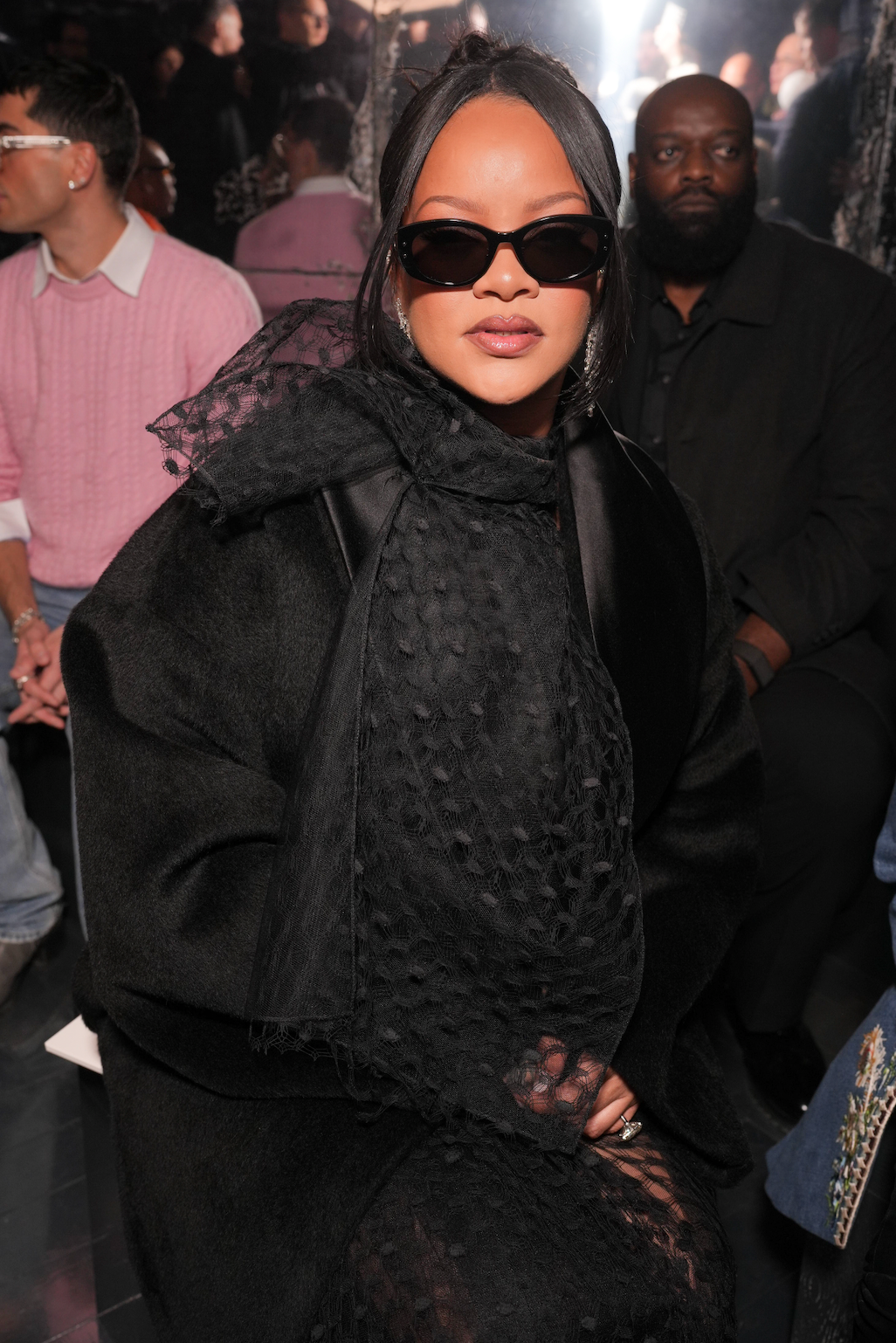 fashion event scene with attendees dressed in stylish outfits