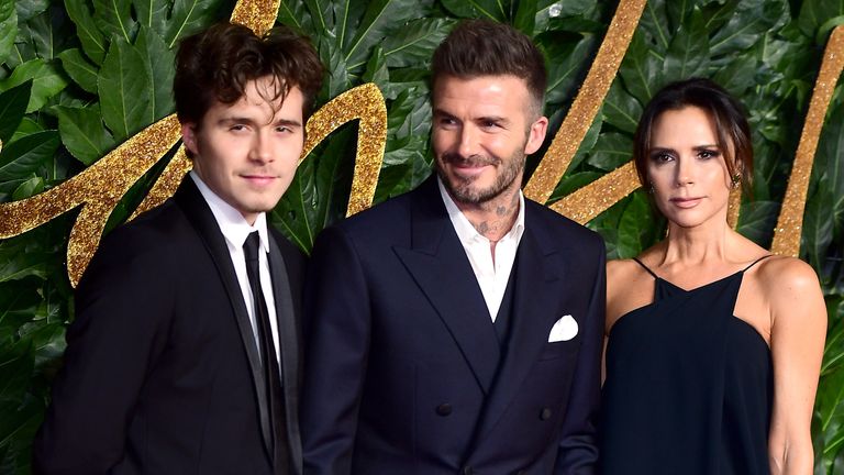 Brooklyn, David and Victoria Beckham attend the Fashion Awards at London's Royal Albert Hall in 2018. Pic: PA