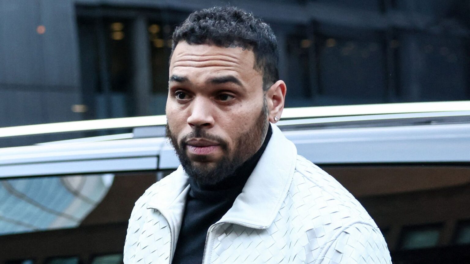 Chris Brown outside Southwark Crown Court on Wednesday. Pic: Reuters