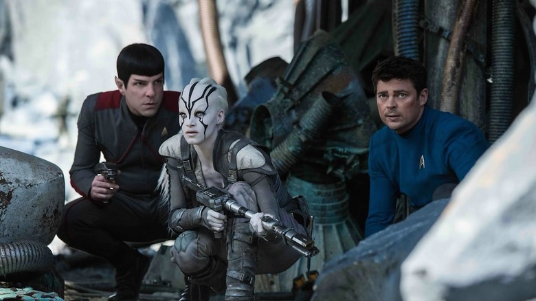 Spock, Jayllah, and Bones planning their next move in 