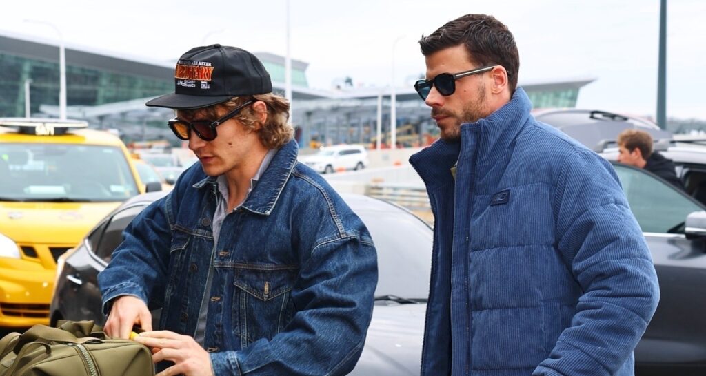 Connor Storrie & François Arnaud Catch Flight Out of NYC Together After Promoting ‘Heated Rivalry’ | Connor Storrie, Francois Arnaud, Heated Rivalry | Celebrity News and Gossip | Entertainment, Photos and Videos