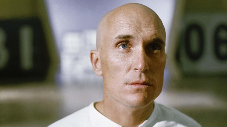 Robert Duvall as THX 1138 looking upward in THX 1138