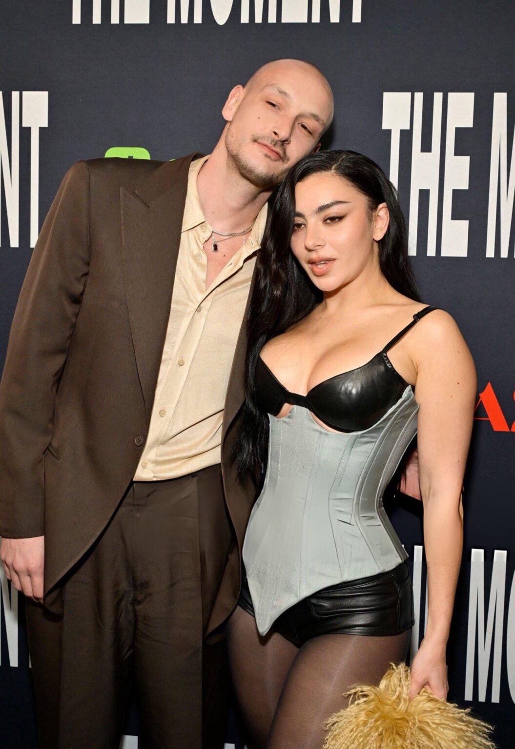 Charli xcx repurposes her Grammys corset for the Los Angeles premiere of "The Moment"