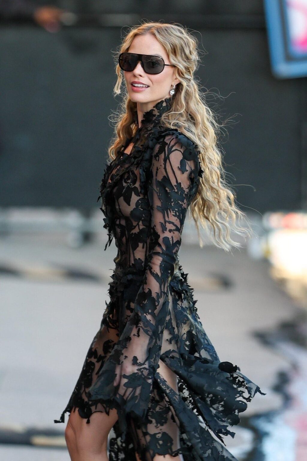 Margot Robbie wearing Alexander McQueen on Jimmy Kimmel Live to promote Wuthering Heights