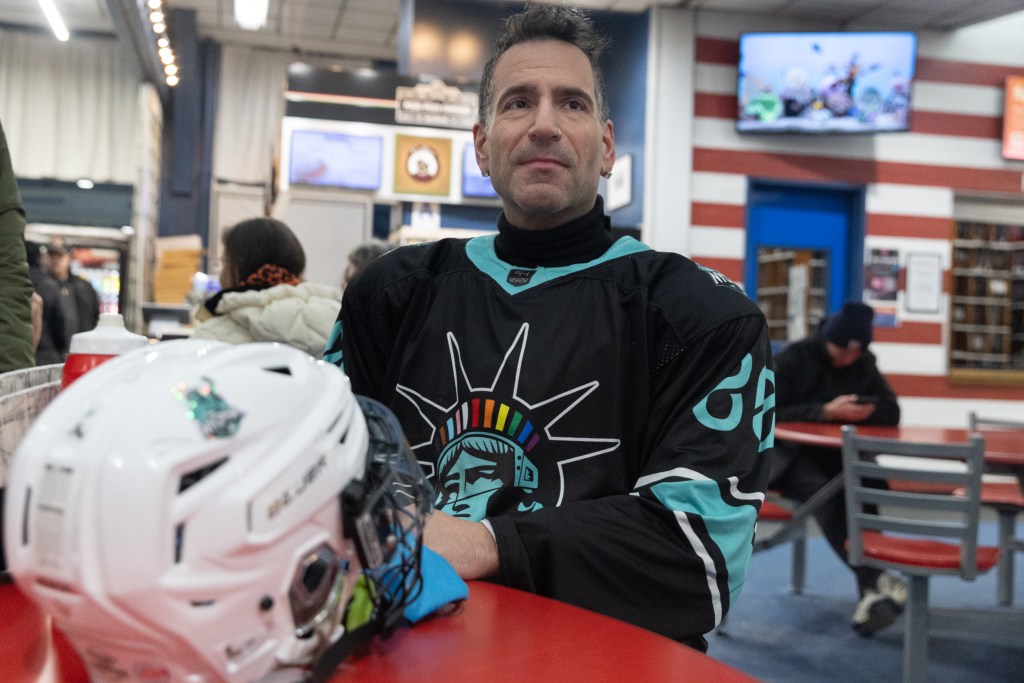 Steven Greenberg waits at Chelsea Piers in his hockey gear to get on the ice.
