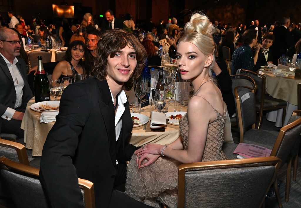 LOS ANGELES, CALIFORNIA - JANUARY 15: (L-R) Malcolm McRae and Anya Taylor-Joy attend Champagne Collet & OBC Wines' celebration of The 28th Annual Critics Choice Awards at Fairmont Century Plaza on January 15, 2023 in Los Angeles, California. (Photo by Michael Kovac/Getty Images for Champagne Collet & OBC Wines)