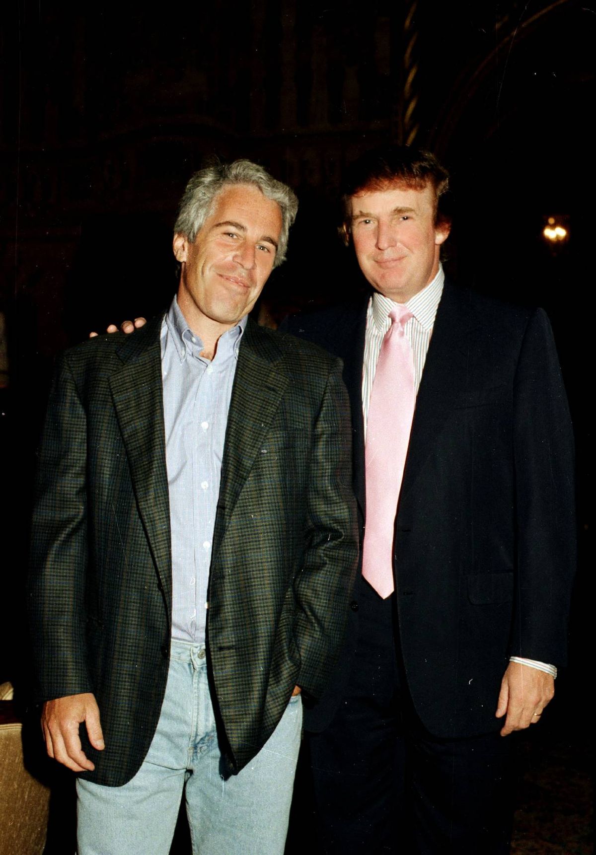 Portrait of American financier Jeffrey Epstein (left) and real estate developer Donald Trump as they pose together at the Mar-a-Lago estate, Palm Beach, Florida, 1997.