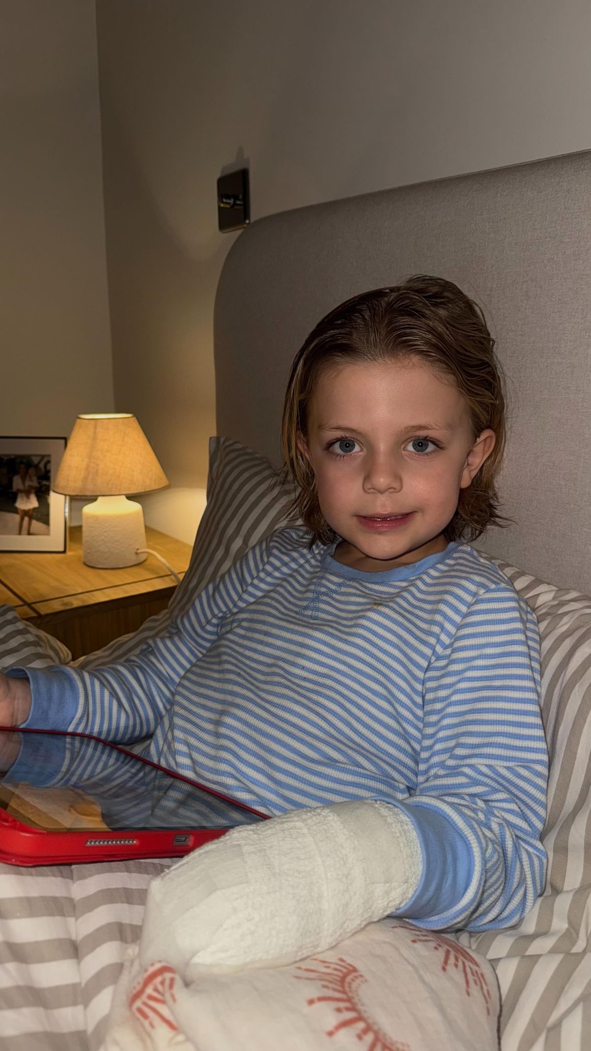 Chloe showed her son smiling despite his pain