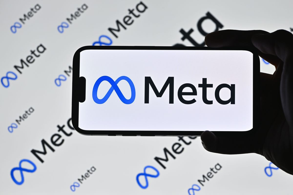 The logo of Meta is displayer on a mobile phone screen in Ankara, Turkiye