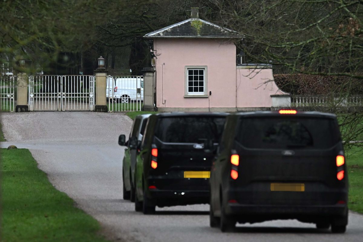 Unmarked Police vehicles enter the gates of the Royal Lodge, Andrew Mountbatten-Windsor's former residence in Windsor Great Park, 