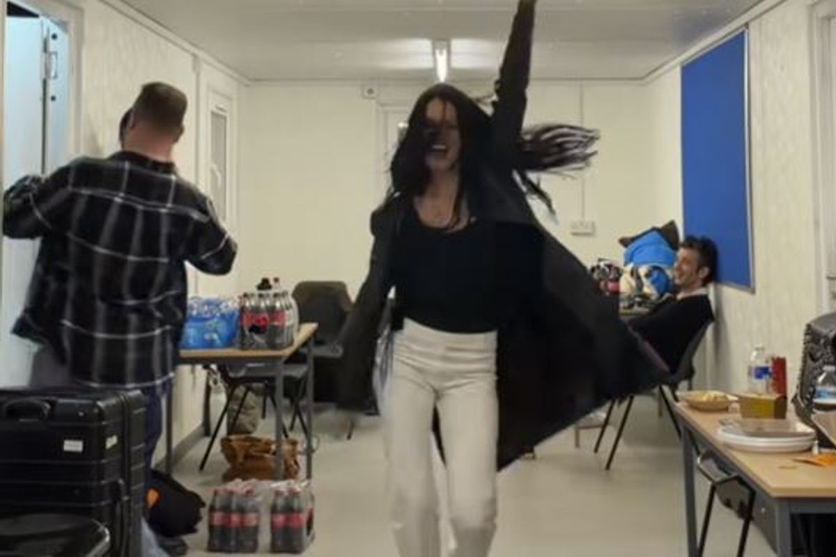 Gabbriette Bechtel backstage at Sunday for Sammy with Matty Healy in the background