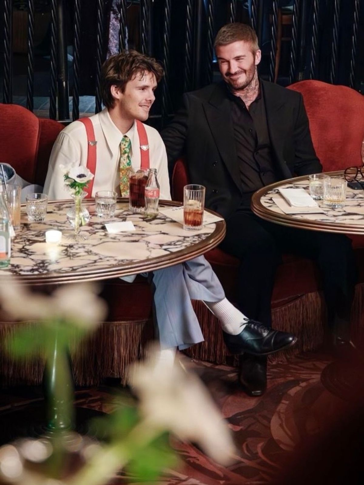 David is seen smiling at his son