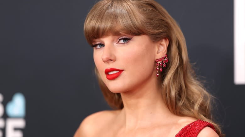 Taylor Swift in a red dress at a red carpet event