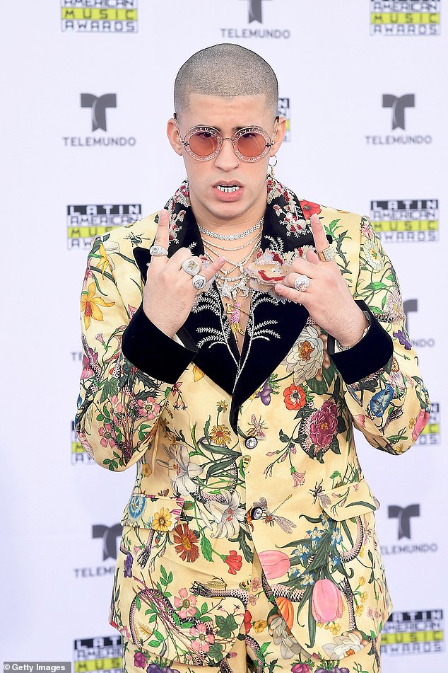 Bad Bunny fans are marvelling at his 'immaculate' A-list transformation from geeky skinhead to handsome hunk after making history with the Album of the Year Grammy win (pictured in 2017)
