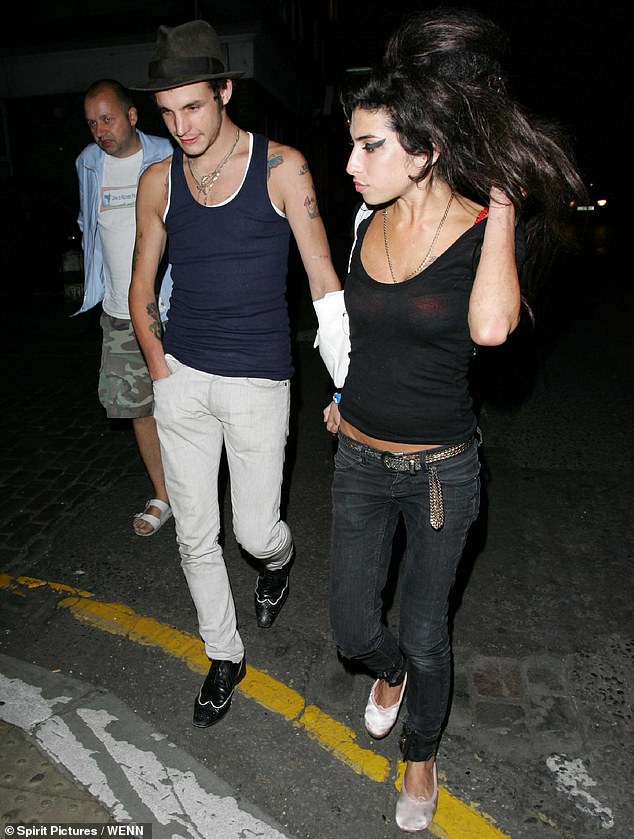 Amy Winehouse and Blake Fielder-Civil leaving the Hawley Arms in Camden, London, 2007