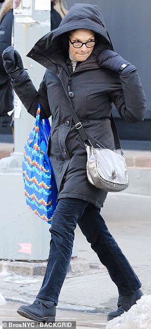She warded off the chill of New York winter with a puffer jacket and a set of mittens