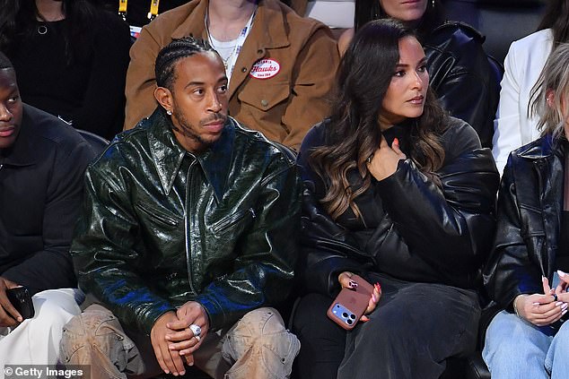 The hitmaker was joined by his model wife, Eudoxie Mbouguiengue (right)