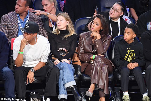 Grey's Anatomy star Ellen Pompeo (second left) and Kelly Rowland (second right) cut stylish figures as they sat next to one another on the front row
