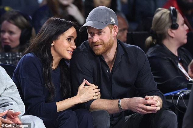 The Sussexes appeared to enjoy a courtside date night as they cozied up to one anoter