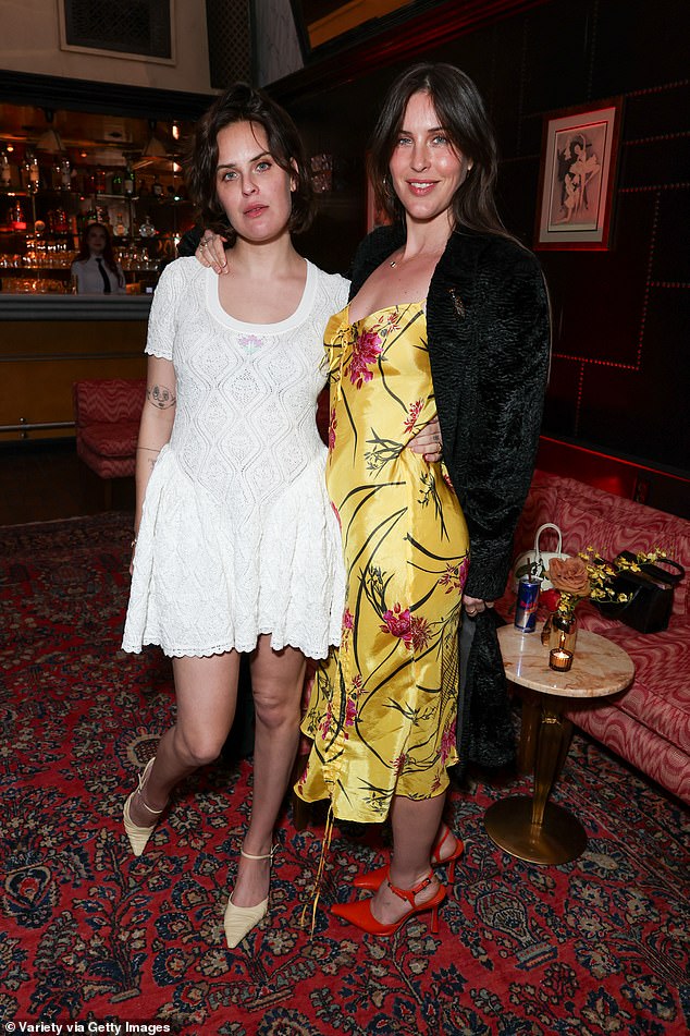Scout Willis turned heads in a yellow floral midi dress as she joined her sister Tallulah and Florence Given for Baz Luhrmann's EPiC: Elvis Presley In Concert Los Angeles premiere afterparty on Wednesday