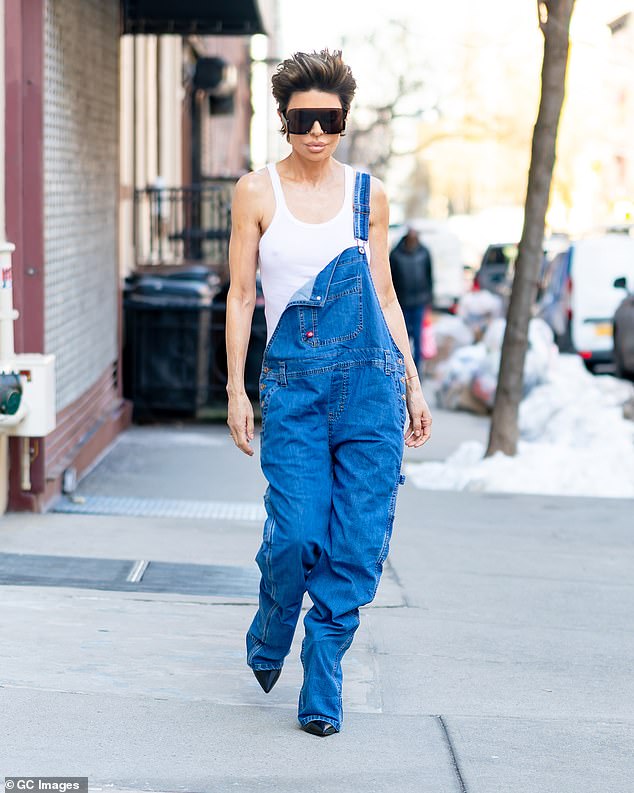 In a bid for attention, Rinna even dressed up in Rausch's signature blue denim overalls