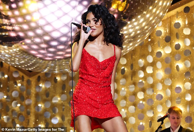 ... and onstage at the Grammy awards last month...