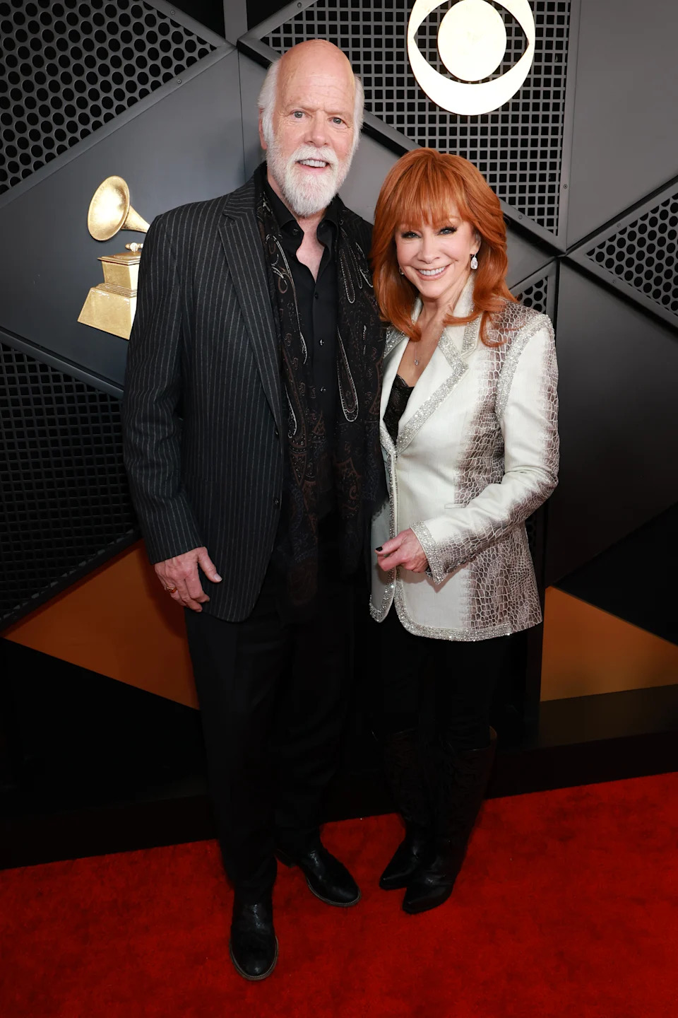 LOS ANGELES, CALIFORNIA - FEBRUARY 01: (L-R) Rex Linn and Reba McEntire attend the 68th GRAMMY Awards on February 01, 2026 in Los Angeles, California. (Photo by Kevin Mazur/Getty Images for The Recording Academy)