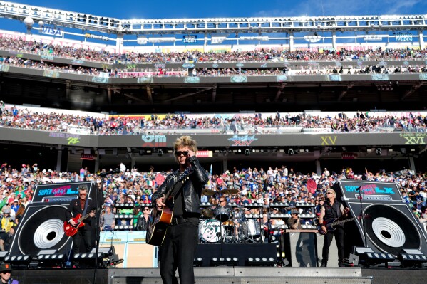 Billie Joe Armstrong, of Green Day performs before prior to the NFL Super Bowl 60 football game between the Seattle Seahawks and the New England Patriots, Sunday, Feb. 8, 2026, in Santa Clara, Calif. (AP Photo/Brynn Anderson)