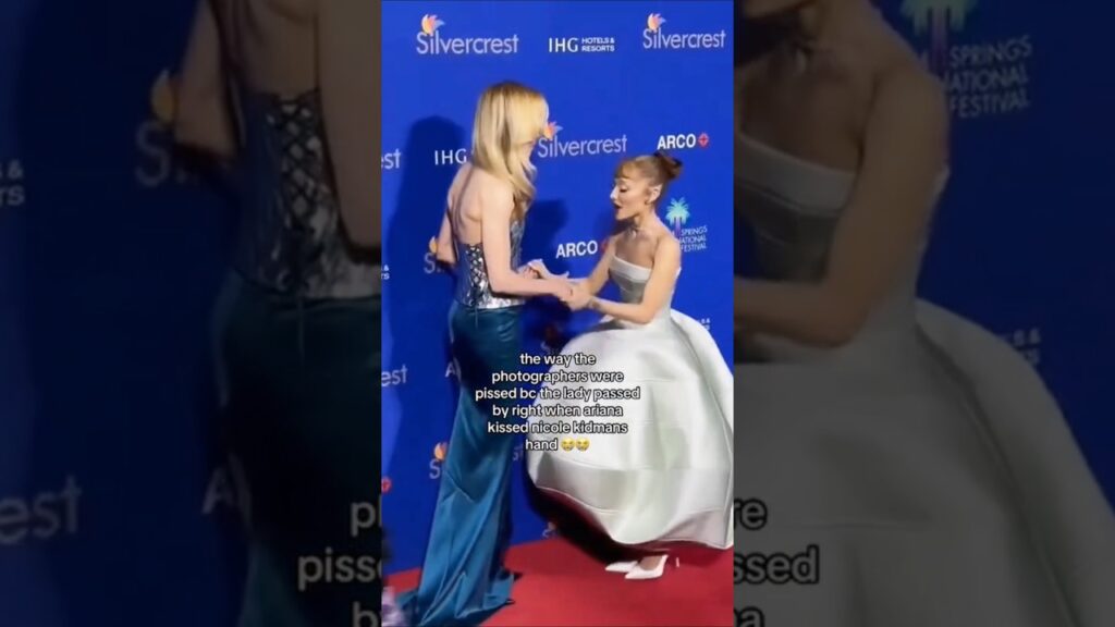 The way the photographers reaction as a lady passed when Ariana Grande kissed Nicole Kidman's hand😭