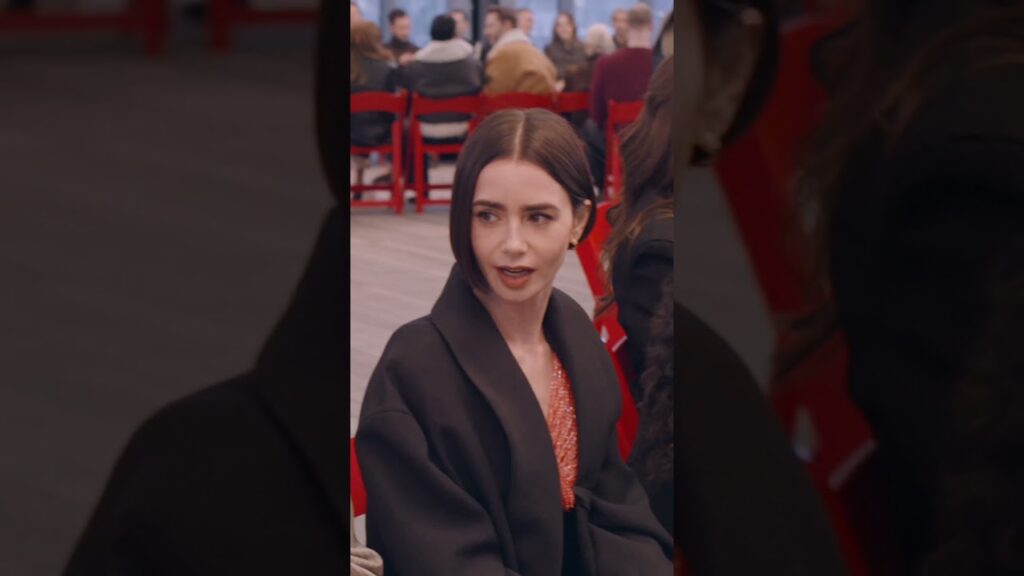 Pre-show moments. Lily Collins seen at the Calvin Klein Collection Fall 2026 show by Veronica Leoni.