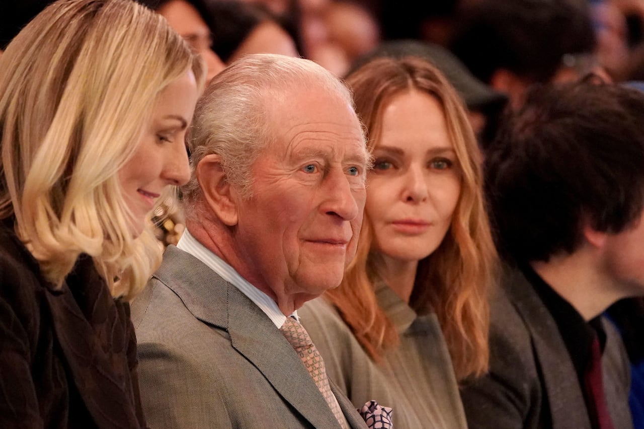 A closeup of three people's faces.