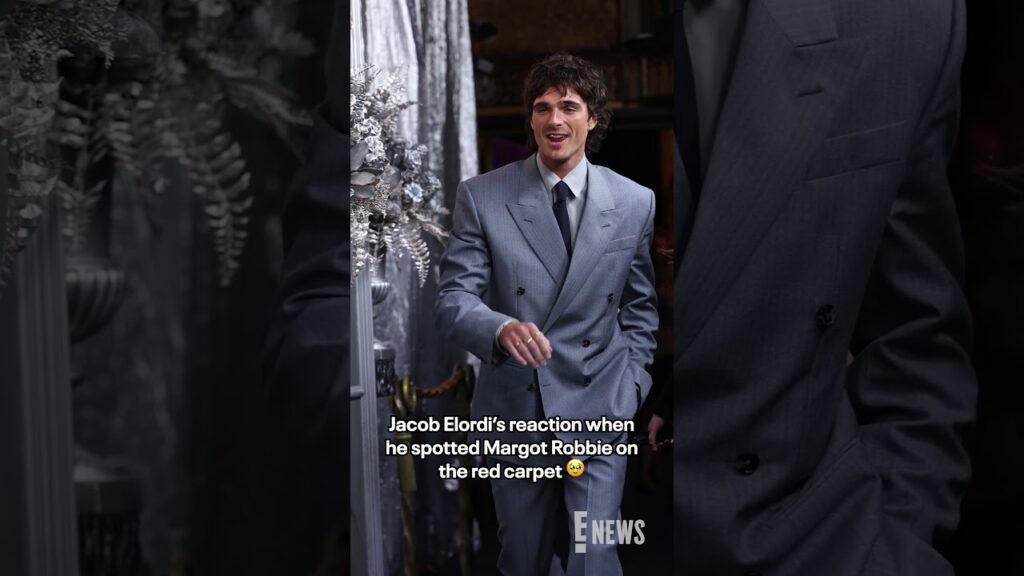Jacob Elordi was all smiles spotting costar Margot Robbie at the "Wuthering Heights" premiere.