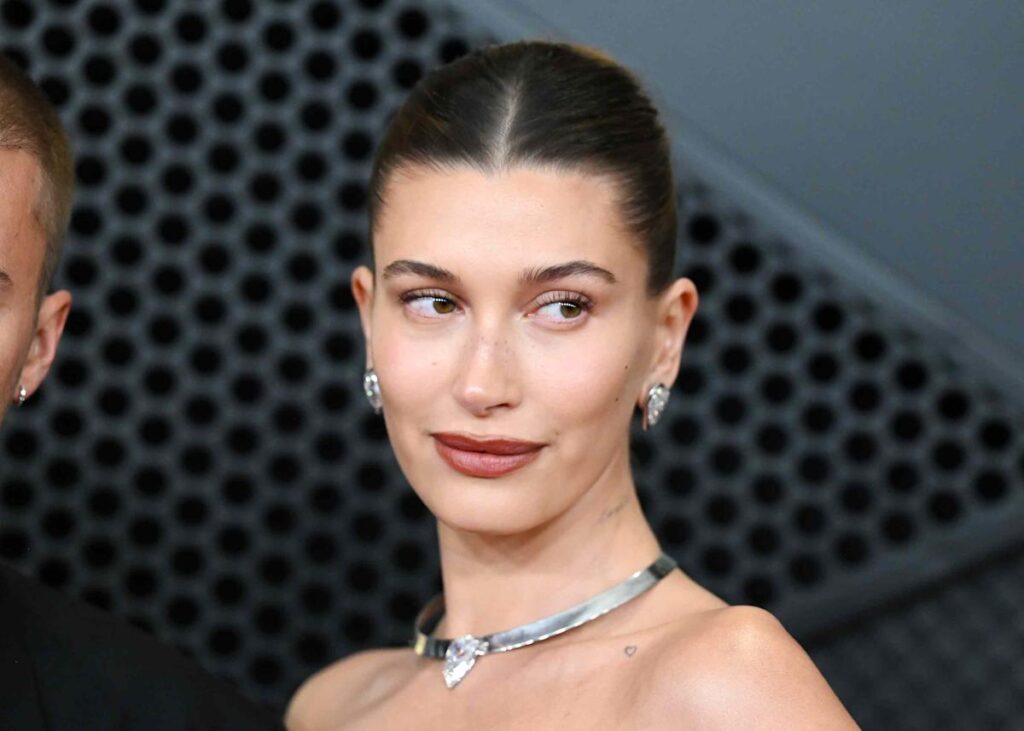 Hailey Beiber Poses in Nothing but a Giant Sculptural Firefly Instead of a Top InStyle