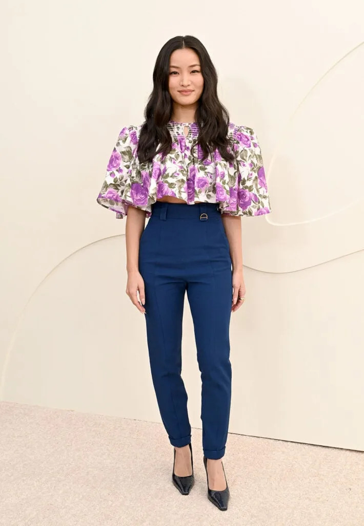 Anna Sawai, Monarch Legacy of Monsters season 2, Apple TV Press Day, Chloe Spring 2026, purple rose print top, high waisted trousers, colour trend press tour, London press style